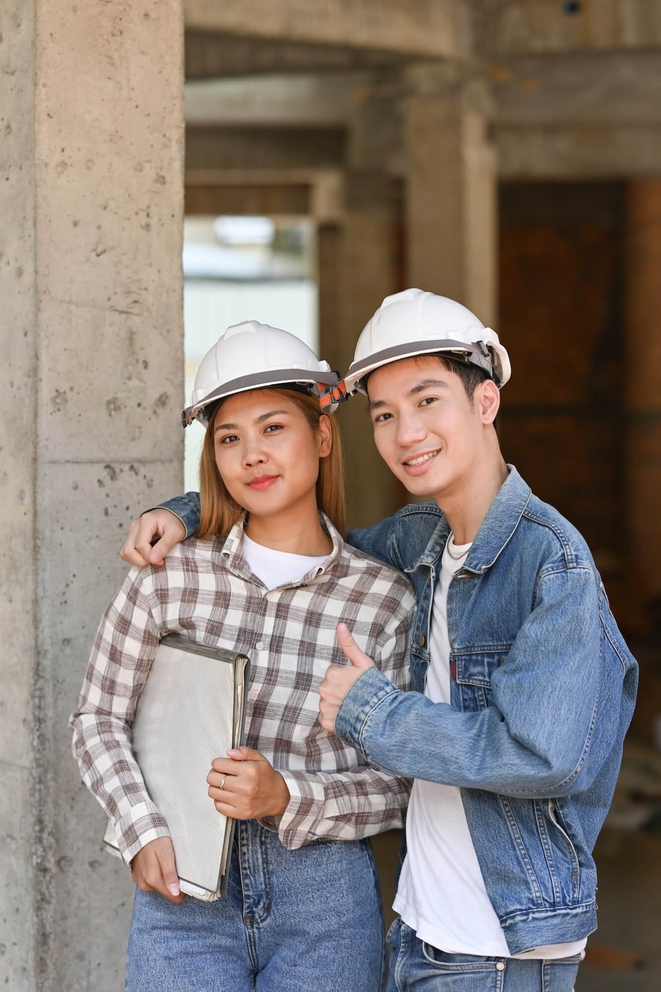 two-happy-investors-in-helmet-standing-at-construction-site-real-estate-investors-concept-1-1.jpg